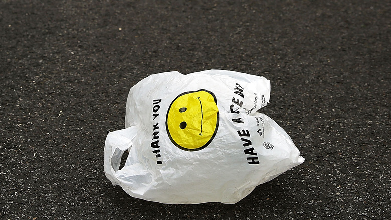 plastic bag on asphalt