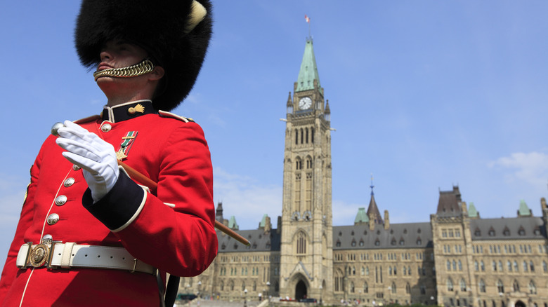 A British Royal Guard in front of a building