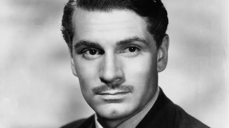 Laurence Olivier with mustache press photo