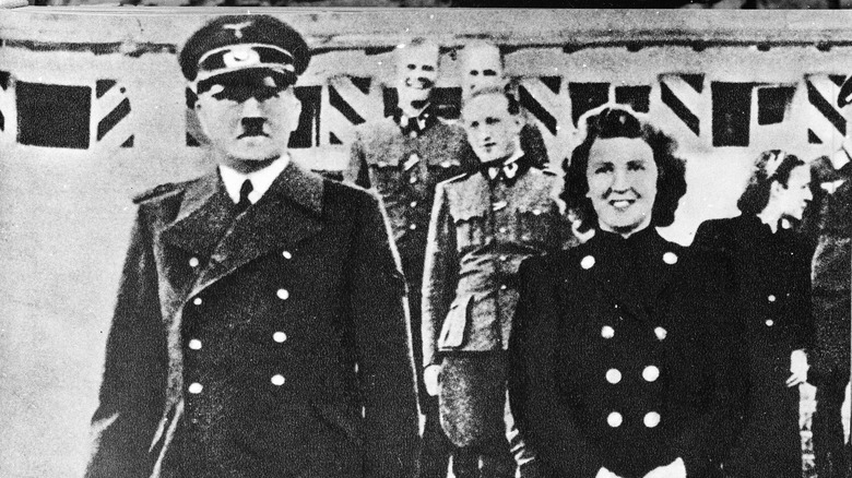 Hitler and Eva Braun in double breasted coats