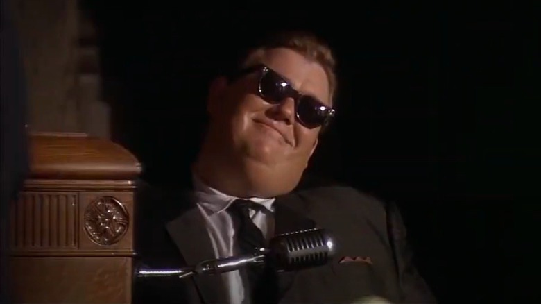 John Candy sunglasses smiling JFK scene