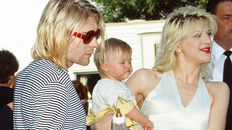 Kurt Cobain with Courtney Love and baby Frances Bean