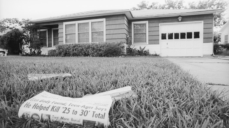 newspaper with corll headline on lawn