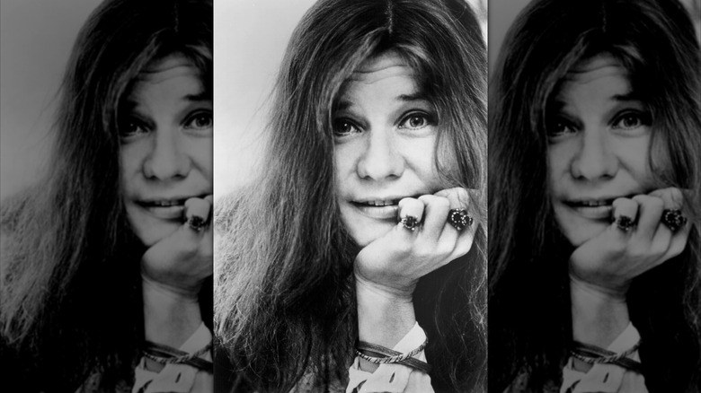 Janis Joplin resting her chin on her hand