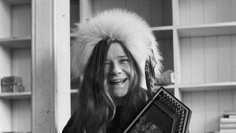 Janis Joplin wearing a fur hat