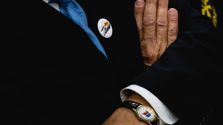 Transgender Kentucky pin and GOP watch worn by same man