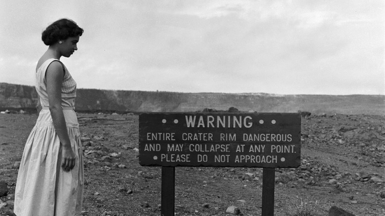 A woman on a volcano in a Hawaiian National Park