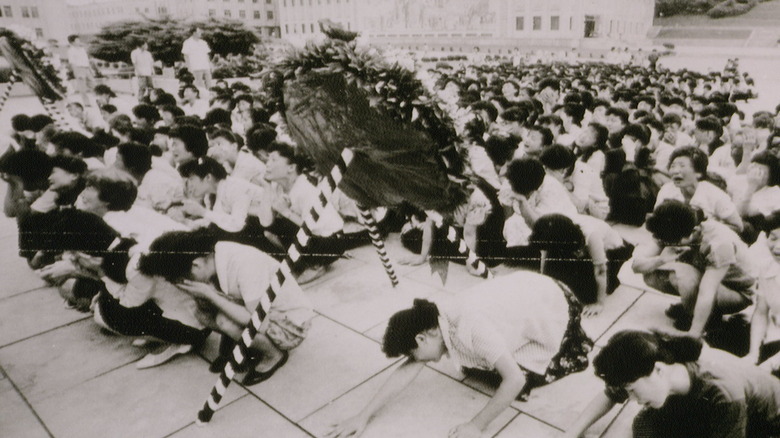 Women prostrating themselves in mourning for Kim Il-sung