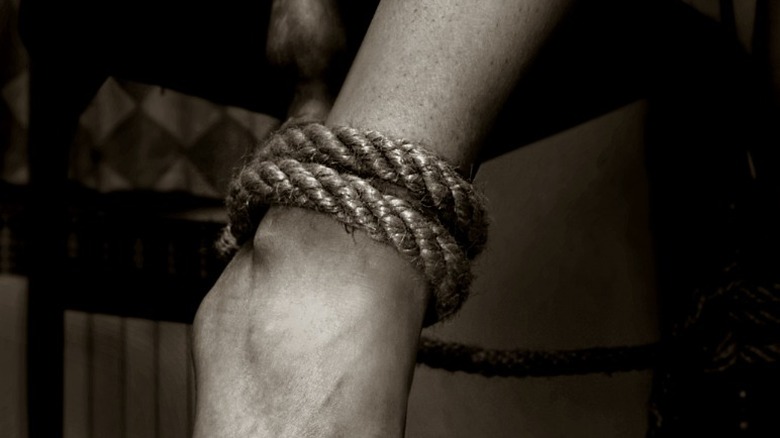 Arm bound with rope