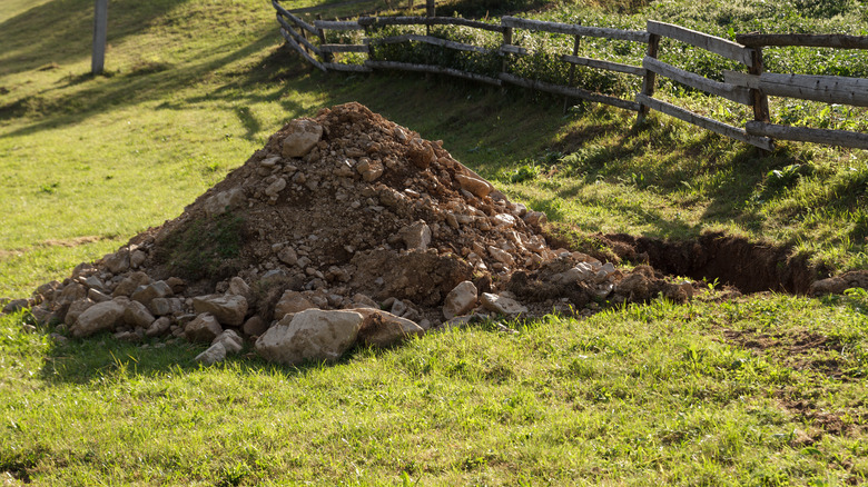 open grave in yard