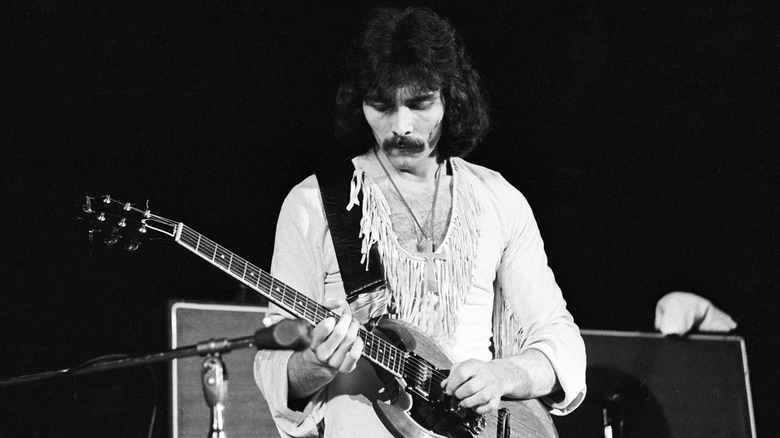 Tony Iommi playing guitar