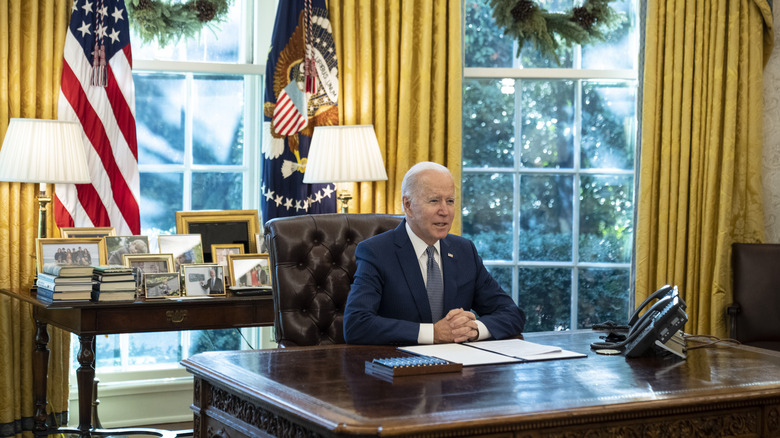 President Joe Biden speaks in the Oval Office