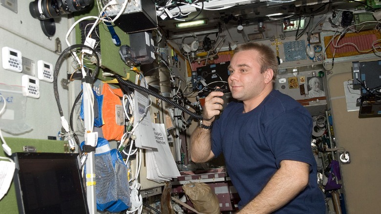 Russian cosmonaut Maxim Suraev conducts a ham radio session on the ISS