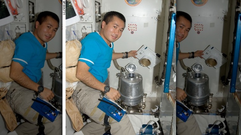 Astronaut Koichi Wakata working on the laboratory of the International Space Station.