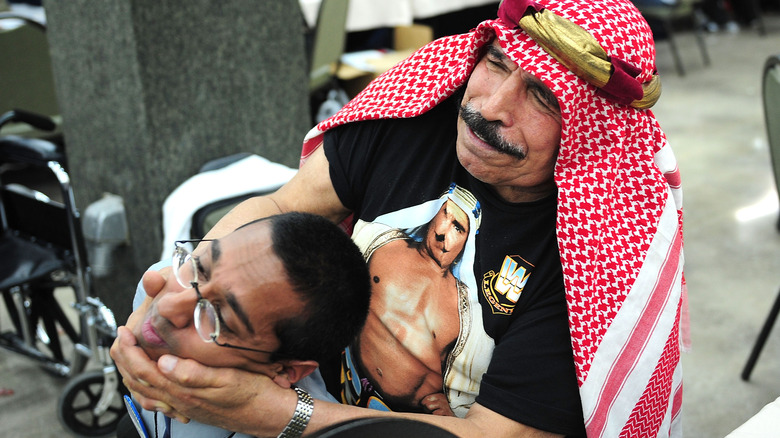 Iron Sheik demonstrates a wrestling move