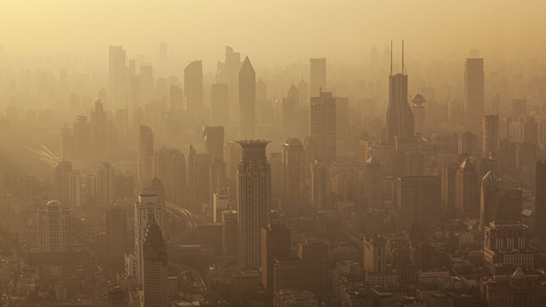 Amber smog over Shanghai skyscrapers