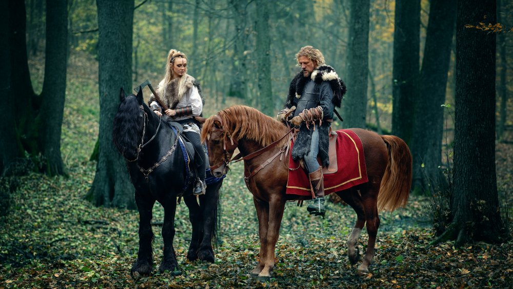 Sexy Vikings hanging out in a forest