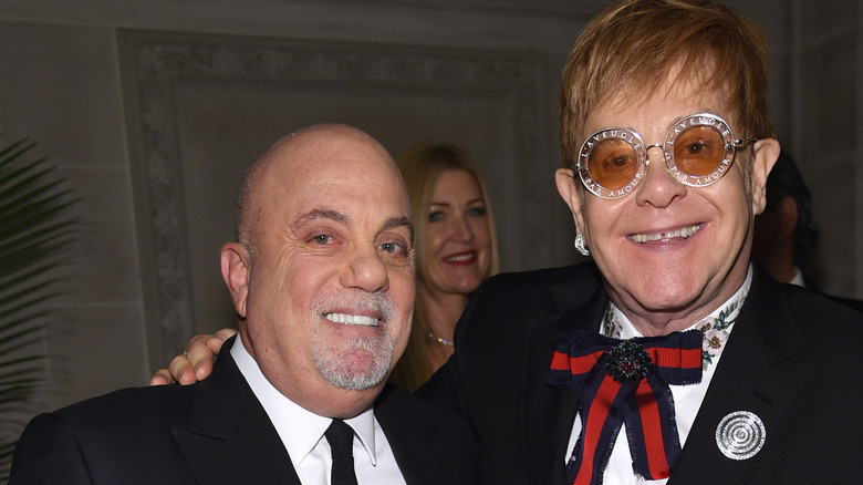 Billy Joel and Elton John smilling