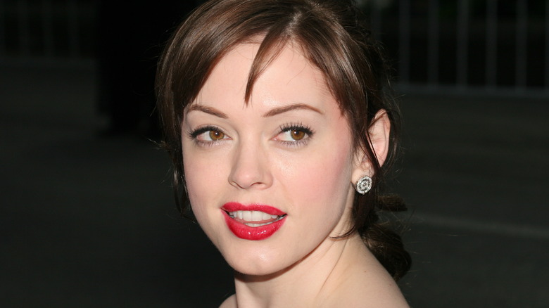 Actress Rose McGowan posing for a photo