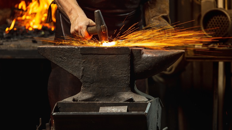 Blacksmith working on an anvil