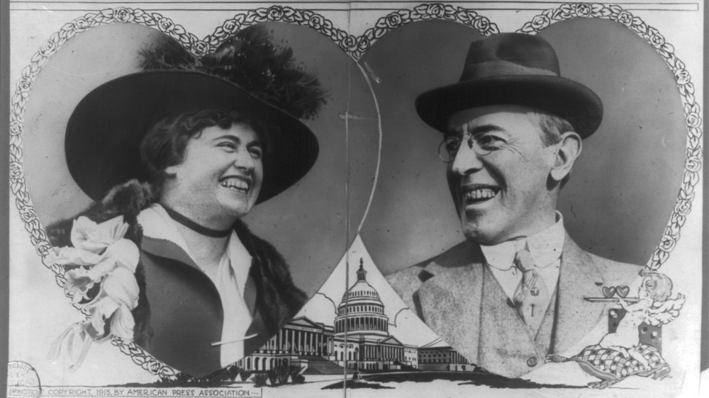 Woodrow Wilson and Edith Bolling Galt, head-and-shoulders portraits cut in the shape of overlapping hearts with rose border; drawing of cupid in lower right and of the U.S. Capitol, 1915