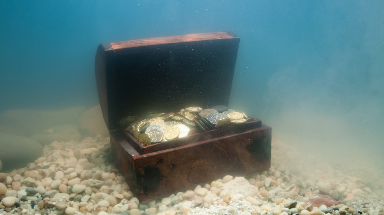 Sunken treasure chest in ocean