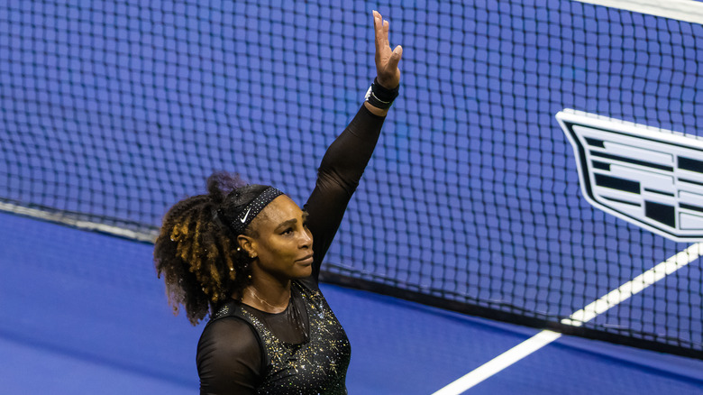 Serena Williams waves goodbye