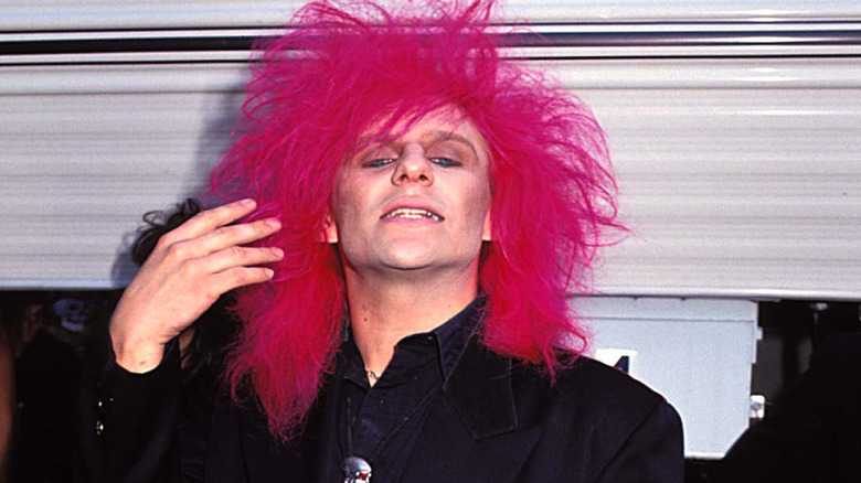 c.c. deville of poison showing off pink wig at 1991 mtv vmas