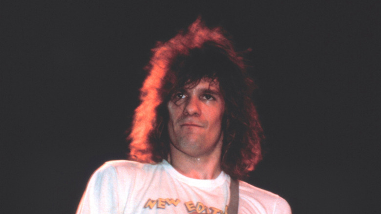 paul westerberg playing with the replacements on stage in the 1980s