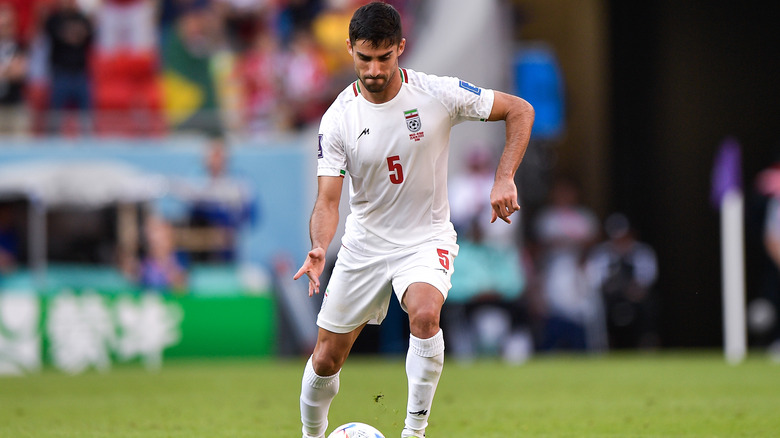 Iran's Milad Mohammadi with the ball