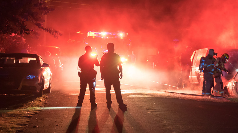 Firefighters silhouette smoke fire