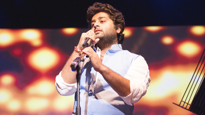 Arijit Singh performing onstage