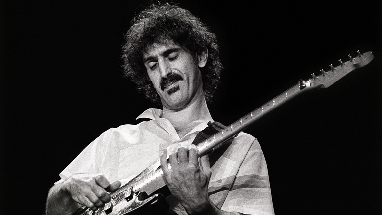 Frank Zappa playing guitar onstage