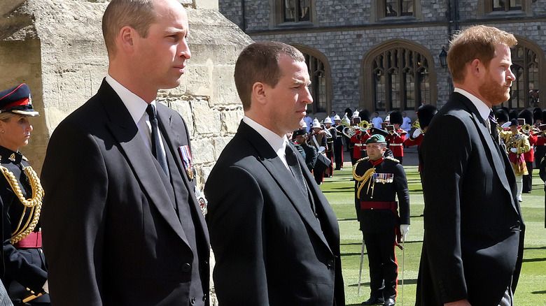 william and harry walking the procession at philip's funeral