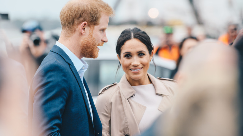 harry and meghan at an event