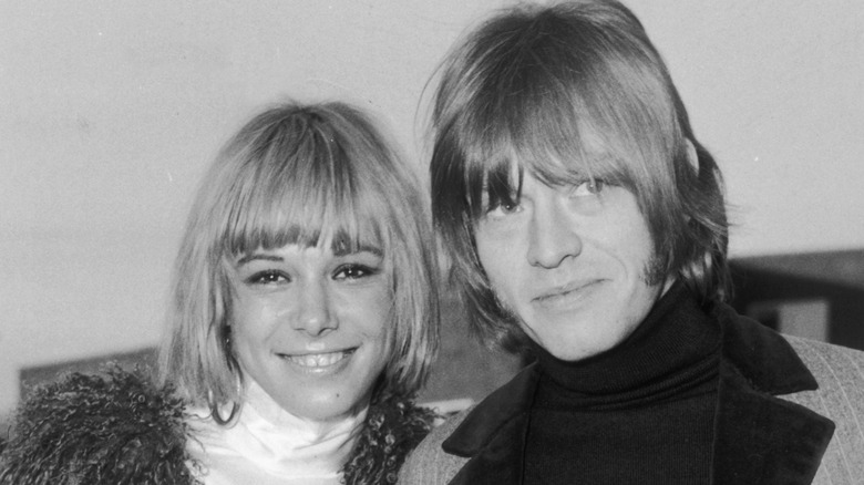 Anita Pallenberg and Brian Jones smiling