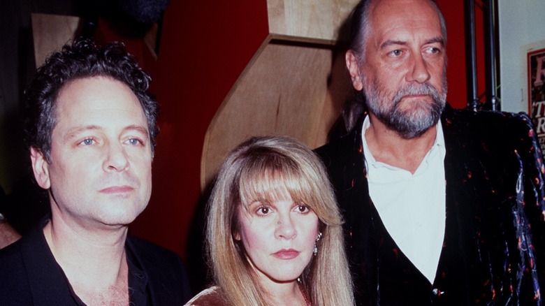 Buckingham, Nicks, and Fleetwood posing