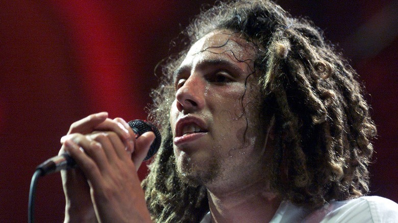 Zach De La Rocha dreadlocks singing