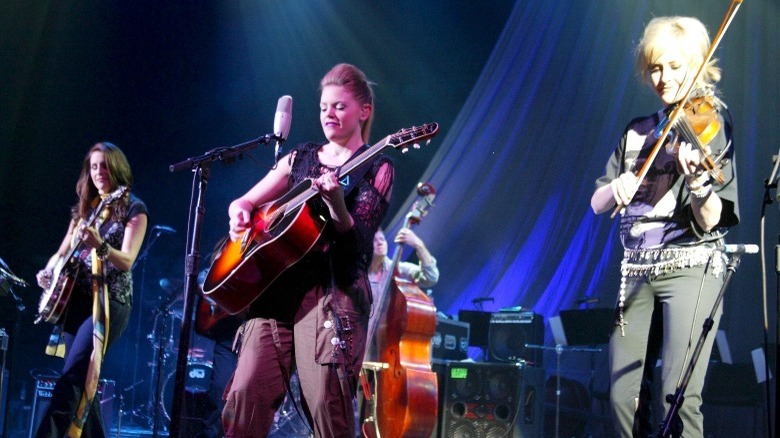 The Chicks performing string instruments onstage