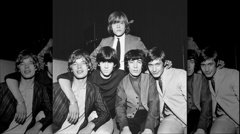 Rolling Stones posing and smiling