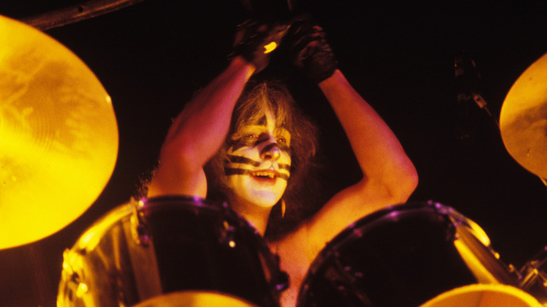 peter criss playing drums with kiss in the 1970s