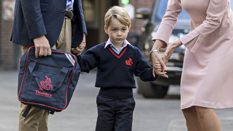 rince George of Cambridge arrives for his first day of school