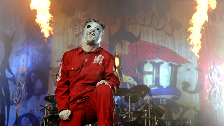 Slipknot's Corey Taylor on stage with fire exploding behind him at the Soundwave Music Festival in 2012