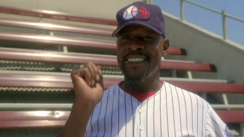 Sisko in a baseball uniform