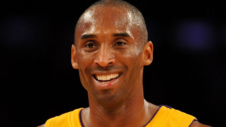 Kobe Bryant smiling while playing for the Los Angeles Lakers