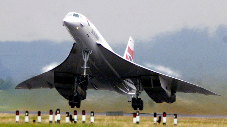 Close up of supersonic Concorde airplane landing on a runway