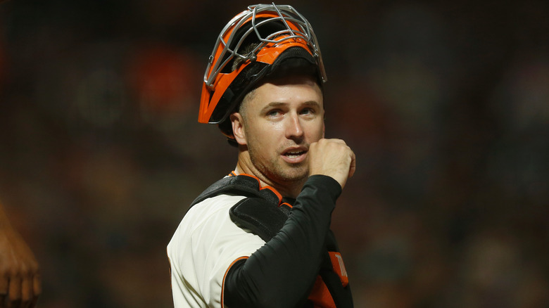 Buster Posey looks left