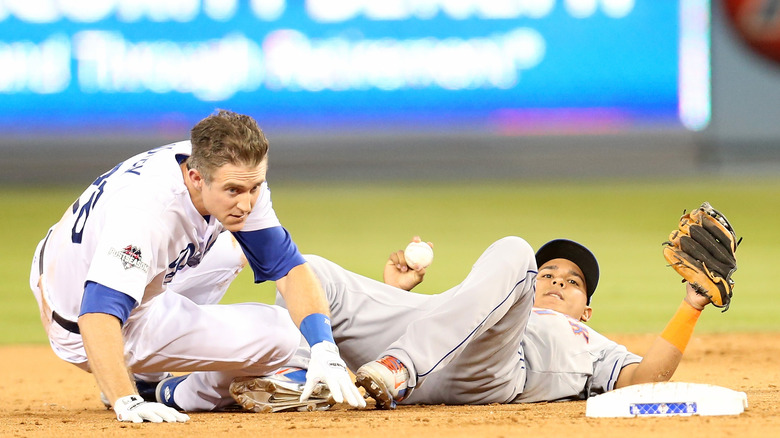 Chase Utley slides into Ruben Tejada