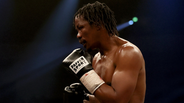 kassim ouma shirtless boxing gloves