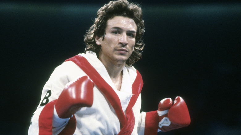 ray mancini in boxing robe and gloves 